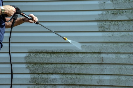 Vinyl siding care removing low level green algae stains from burlington homes